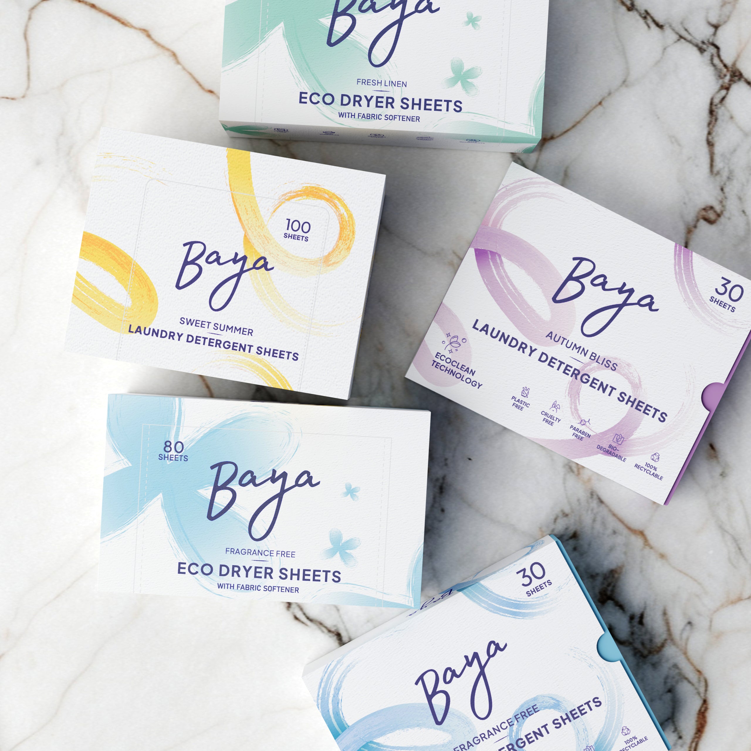 Four colorful boxes with abstract designs on a pastel background.