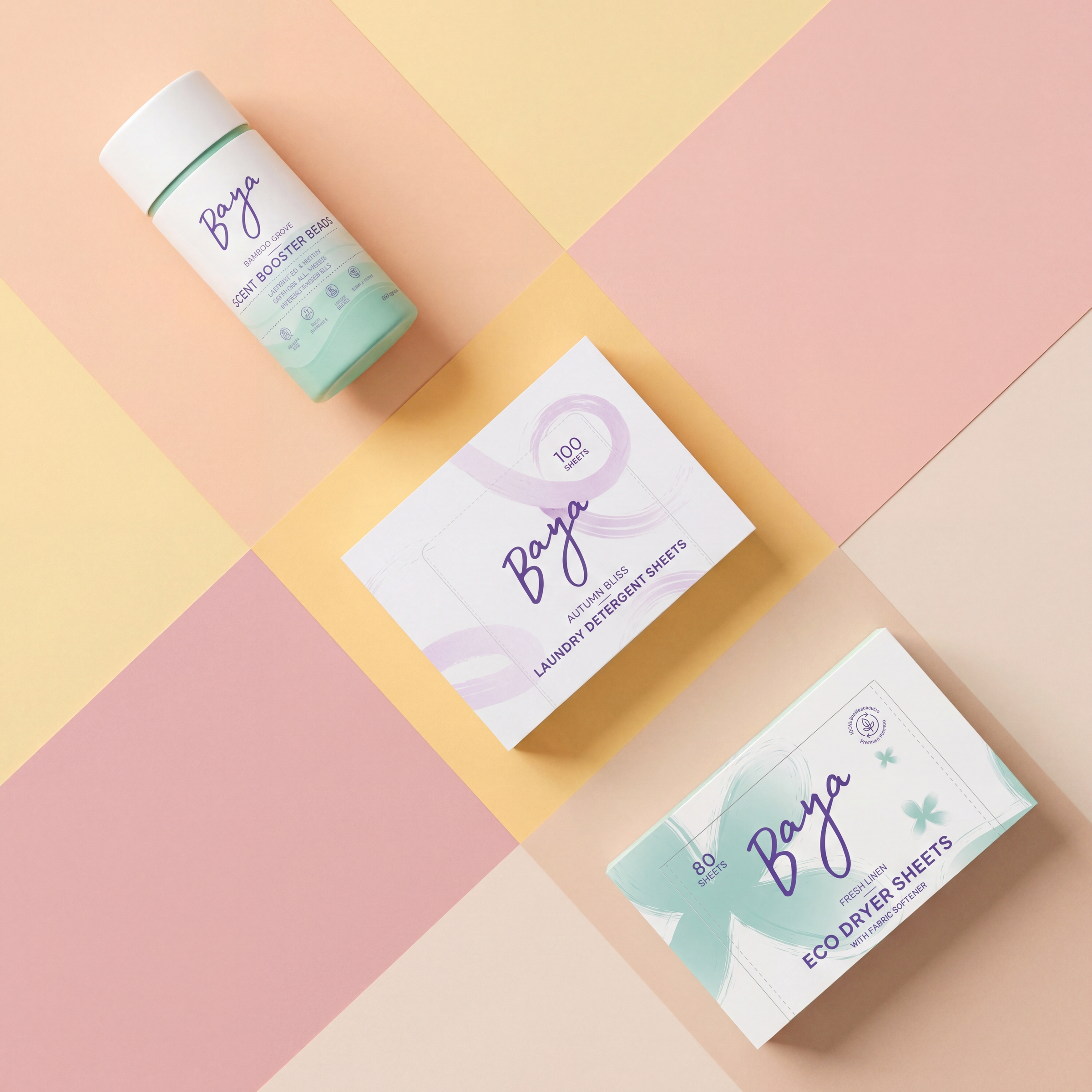 Four colorful boxes with abstract designs on a pastel background.